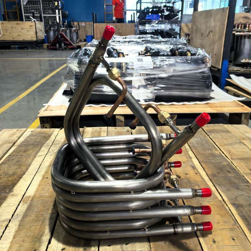 Titanio TA1 Intercambiador de calor coaxial de tubo interior con presión máxima del lado del agua de 1,0 MPA para una transferencia de calor industrial duradera